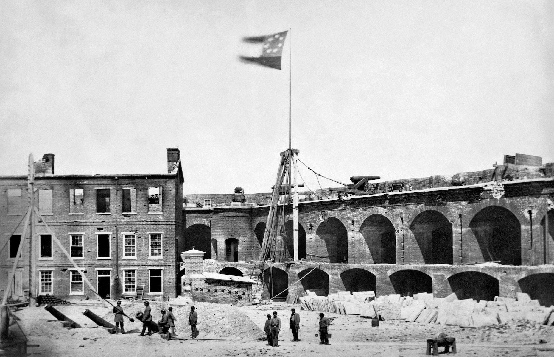1861: Confederate flag flying over Fort Sumter